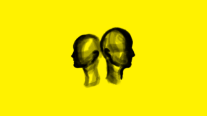 Czarny rysunek dwóch głów na żółtym tle