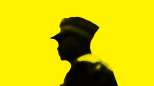 Abstrakcyjny rysunek żołnierza w kolorze czarnym na żółtym tle wygenerowany przez sztuczną inteligencję